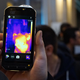 MSX technology allows the phone to combine the data from both the FLIR sensor and regular one. You can appreciate the architectural details in the background of the image.